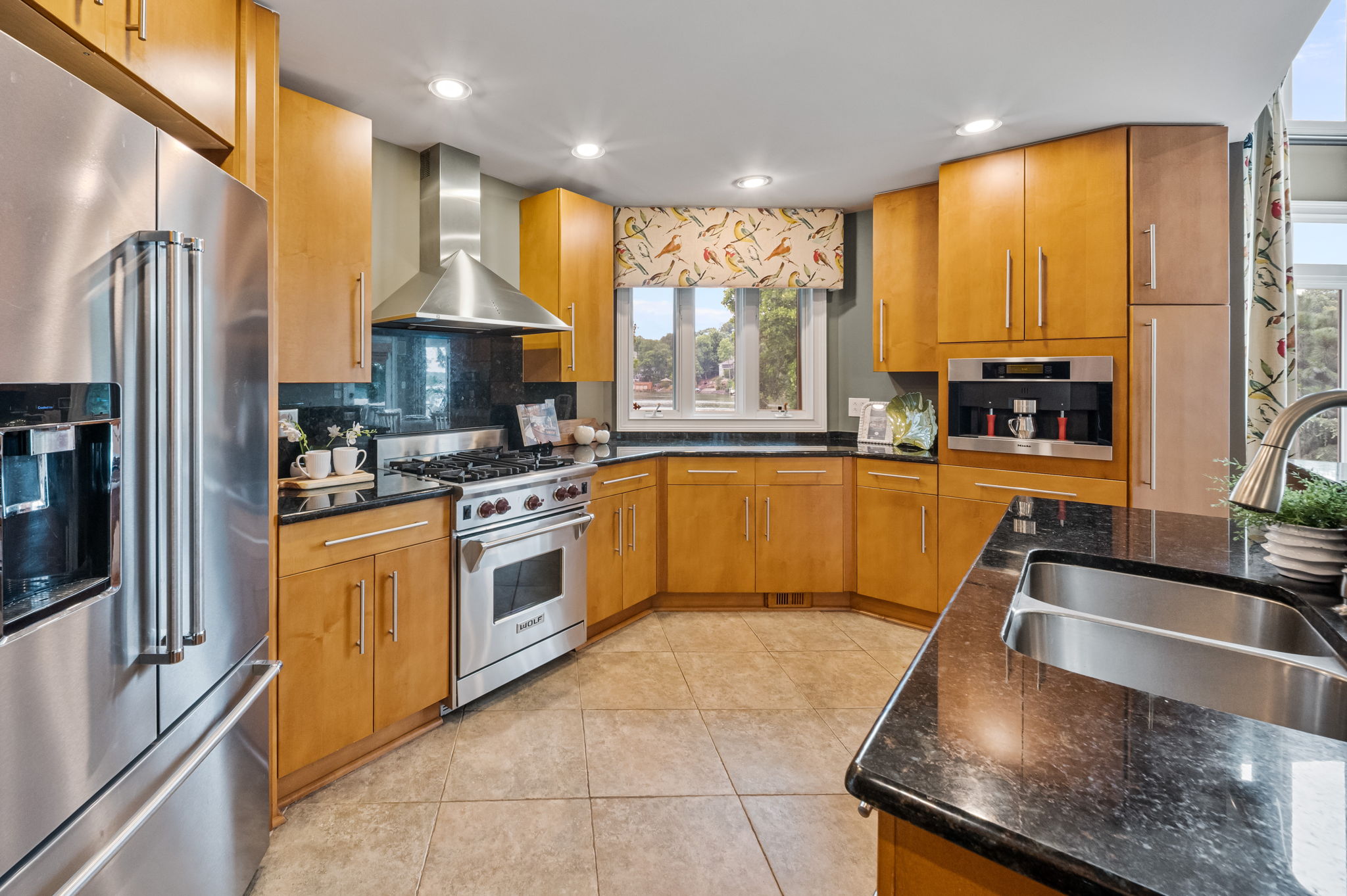 Chef's kitchen with Canadian maple cabinetry and premium appliances